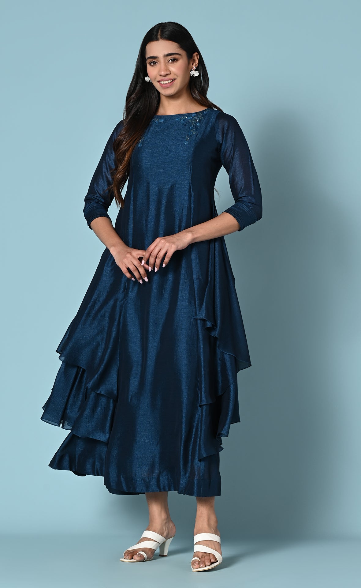 Elegant asymmetric  flared blue kurthi in fabric of the season