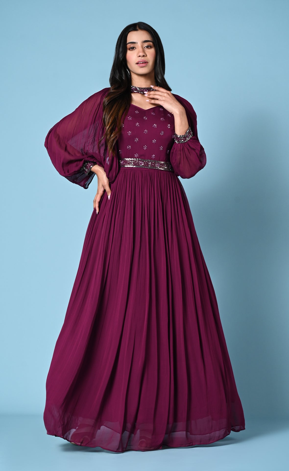 Wine cocktail gown with statement sleeve and hip belt