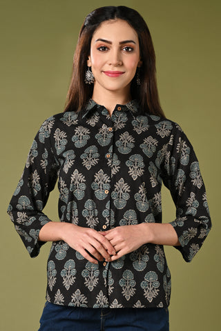 Black and blue floral summer printed short cotton kurti for jean with collar neck.
•	Straight short kurti with floral prints all over.
•	3/4 sleeves, wooden buttons.
•	Collared neck.
•	Pure cotton material.
