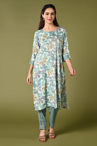 Blue floral printed daily wear rayon kurti set with 3/4 sleeves roundneck single side pocket and straight pants.
•	Floral prints all over the kurti set.
•	Round neck,3/4 sleeves & single side pocket.
•	Double sided elastic straight fit pants.
•	All day comfort rayon material.
•	Blue colour with floral prints will give a stylish and vibrant look.
