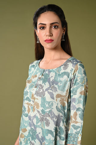 Blue floral printed daily wear rayon kurti set with 3/4 sleeves roundneck single side pocket and straight pants.
•	Floral prints all over the kurti set.
•	Round neck,3/4 sleeves & single side pocket.
•	Double sided elastic straight fit pants.
•	All day comfort rayon material.
•	Blue colour with floral prints will give a stylish and vibrant look.
