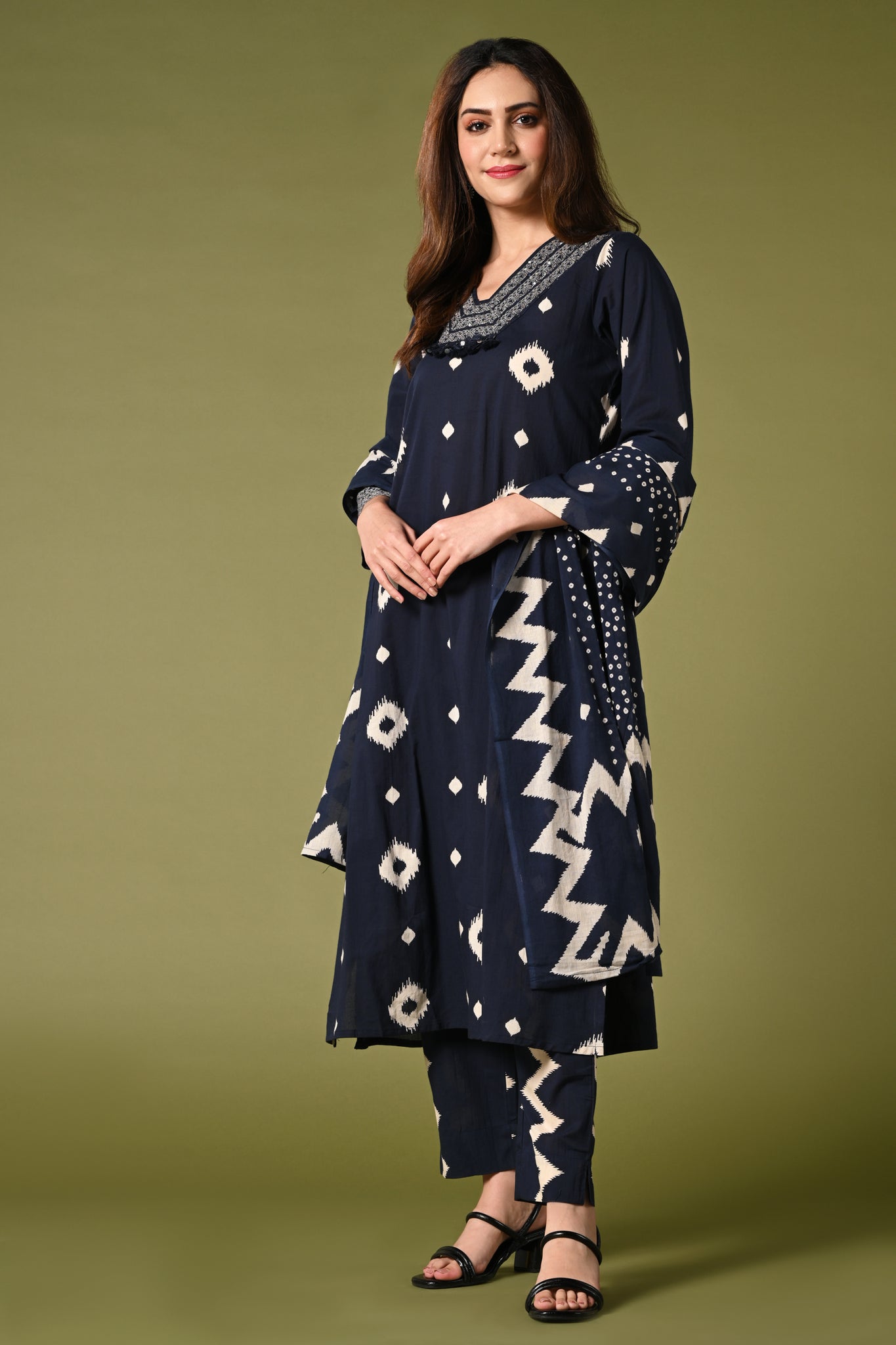 Diamond printed navy-blue daily wear cotton straight kurti set with pant and printed dupatta.
•	Printed top with v neck.
•	Thread and sequin work around the neck,3/4 sleeves.
•	Double sided elastic, printed and comfortable straight pants.
•	Cotton printed dupatta.
•	Pure cotton material.
