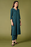 Elegant teal blue cotton flex solid colour kurti set with v neck 3/4 sleeves single side pocket and straight pants.
•	Plain kurti set.
•	V neck, 3/4 sleeves & single side pocket.
•	Single sided elastic and straight fit pants.
•	All day comfort rayon flex material.
•	The teal blue solid colour with cotton flex will give an elegant look.


