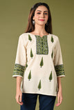 Half white short cotton flex summer kurthi for jean with green leaf prints.
•	Straight short cotton kurti with leaf prints all over.
•	Mild thread work in neck ,3/4 sleeves.
•	 Cotton flex material.
