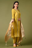 Pale mustard yellow shimmer fabric kurti set with floral printed organza dupatta, gotta patti work and straight pants.
•	Plain top with gotta patti work.
•	Round neck & 3/4 sleeves.
•	Single sided elastic and comfortable straight pants.
•	Floral printed organza dupatta with tassels.
•	Shimmer fabric material
•	The shimmer fabric with prints will give you a perfect occasional look.
