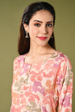 Peach floral printed daily wear rayon kurti set with 3/4 sleeves roundneck single side pocket and straight pants.
•	Floral prints all over the kurti set.
•	Round neck, 3/4 sleeves & single side pocket.
•	Double sided elastic straight fit pants.
•	All day comfort rayon material.
•	Peach colour with floral prints will give a warm look with the touch of freshness and elegance.
