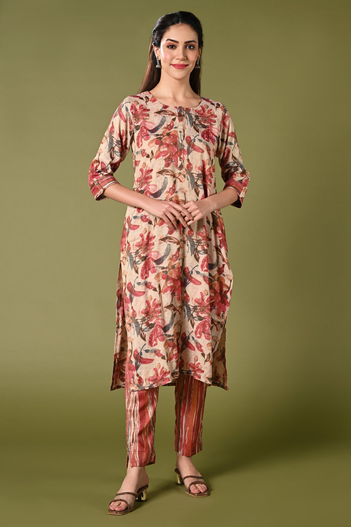 Pink and cream leaf printed rayon daily wear kurti set with 3/4 sleeves roundneck single side pocket and straight pants.