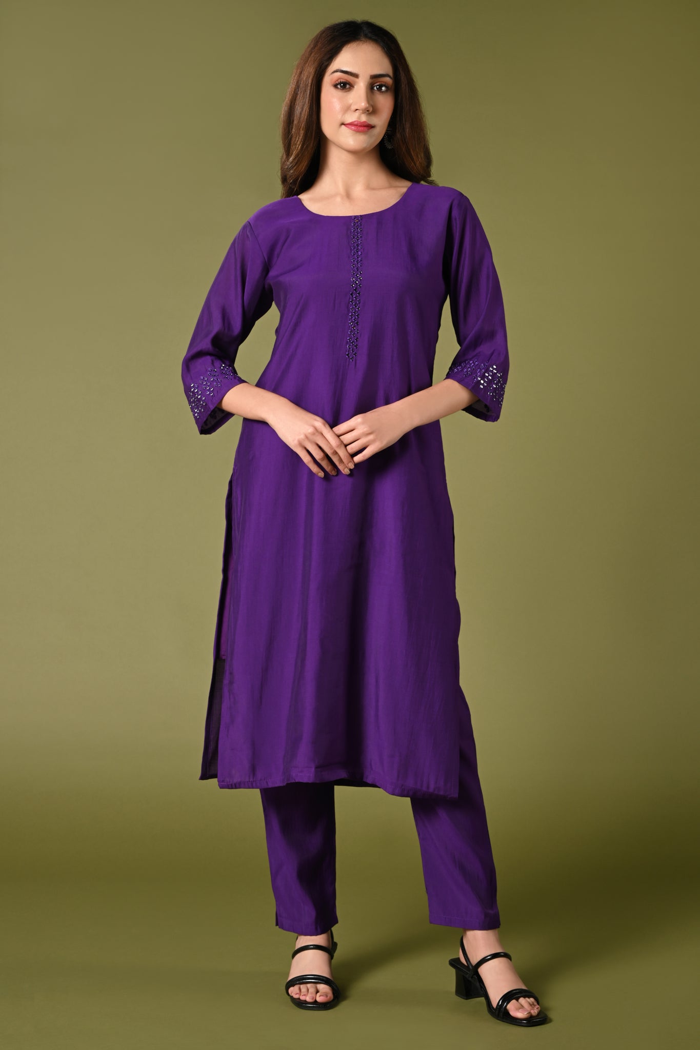 Plain purple mirror worked straight cut set with zari woven dupatta and straight pants.
•	Plain top with mirror-work in neckline and back neck.
•	3/4 sleeves with mirror and thread work in border.
•	Single side elastic comfortable straight pants.
•	Matching purple zari woven dupatta.
•	Chanderi material.
