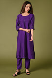 Plain purple mirror worked straight cut set with zari woven dupatta and straight pants.
•	Plain top with mirror-work in neckline and back neck.
•	3/4 sleeves with mirror and thread work in border.
•	Single side elastic comfortable straight pants.
•	Matching purple zari woven dupatta.
•	Chanderi material.
