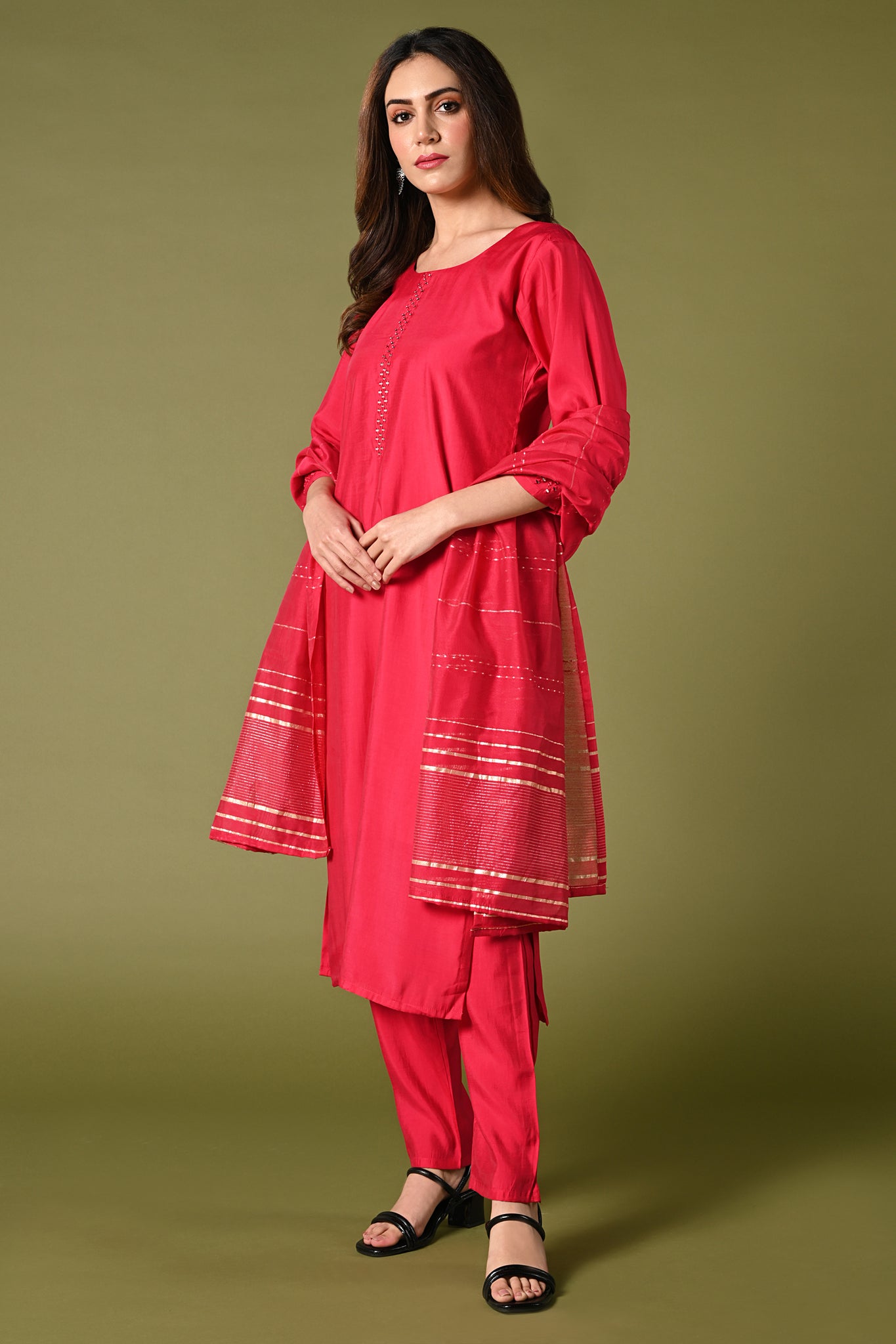 Plain rani pink mirror worked straight cut set with zari woven dupatta and straight pants.
•	Plain top with mirror-work in neckline and back neck.
•	3/4 sleeves with mirror and thread work in border.
•	Single side elastic comfortable straight pants.
•	Matching pink zari woven dupatta
•	Chanderi material.
