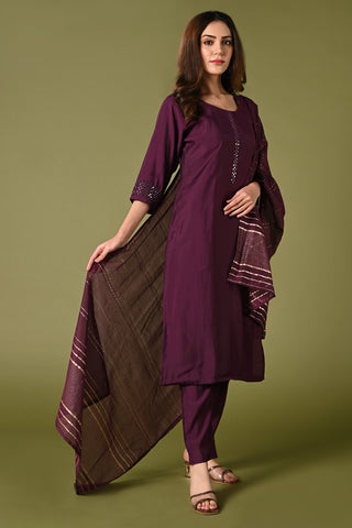 Plain wine mirror worked straight cut set with zari woven dupatta and straight pants.
•	Plain top with mirror-work in neckline and back neck.
•	3/4 sleeves with mirror and thread work in border.
•	Single side elastic comfortable straight pants.
•	Matching wine zari woven dupatta.
•	Chanderi material.
