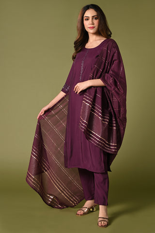 Plain wine mirror worked straight cut set with zari woven dupatta and straight pants.
•	Plain top with mirror-work in neckline and back neck.
•	3/4 sleeves with mirror and thread work in border.
•	Single side elastic comfortable straight pants.
•	Matching wine zari woven dupatta.
•	Chanderi material.
