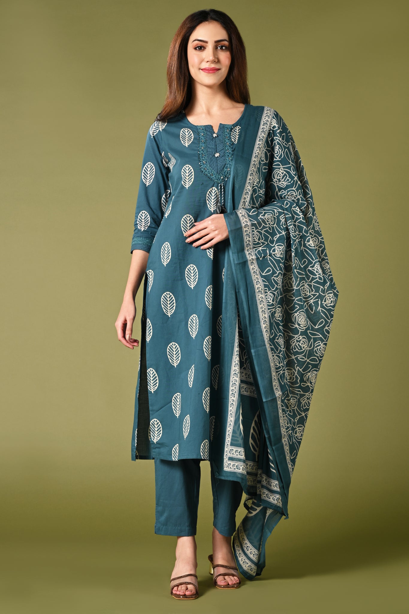 Rama blue leaf printed cotton daily wear kurti set with thread work straight pant and cotton mul dupatta.
•	Leaf prints all over the body.
•	Round neck & 3/4 sleeves.
•	Single sided elastic and comfortable straight pants.
•	Pure cotton material.
•	Cotton mul dupatta.
