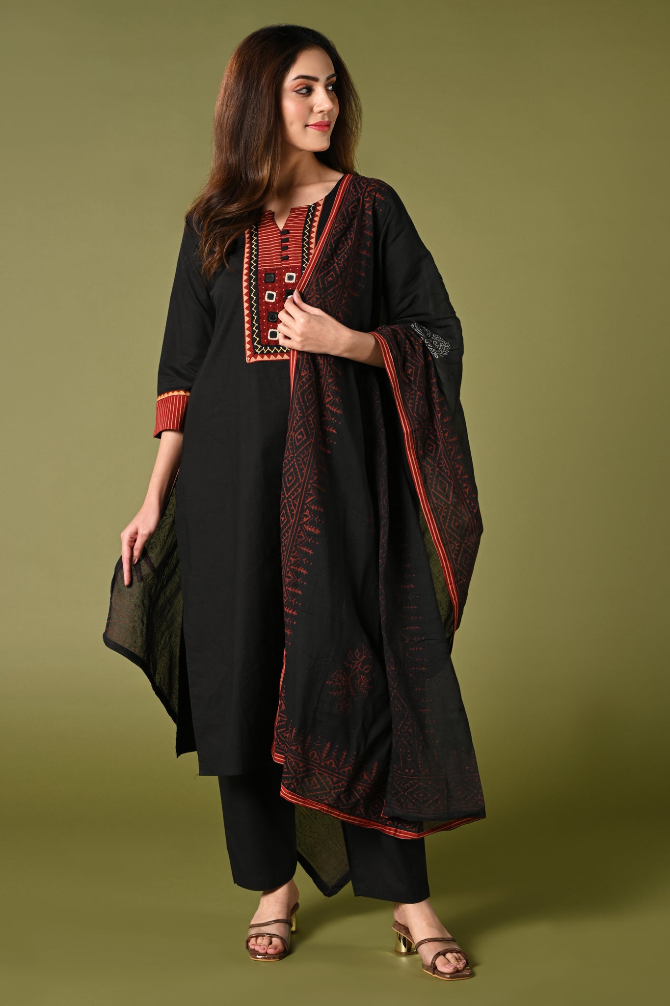 Solid black daily wear kurti set with aplic and mirror work and printed dupatta.