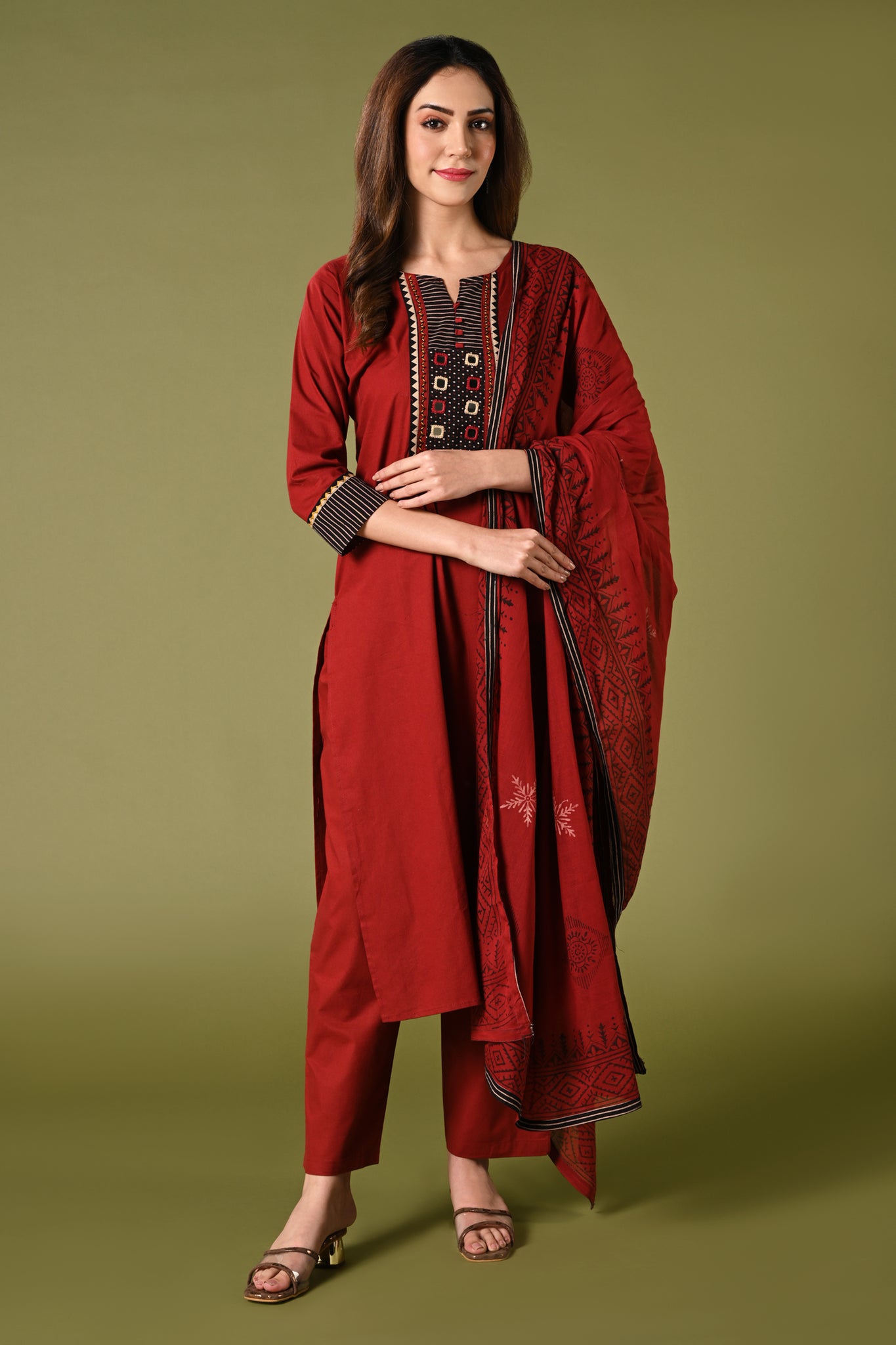 Solid maroon daily wear kurti set with aplic and mirror work and printed dupatta.