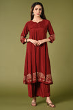  Solid maroon muslin kurti set with elepant print in border and sleeves.
•	Plain colour kurti with elephant prints in border and sleeve.
•	Round neck & 3/4 sleeves.
•	Double sided elastic and comfortable straight fit pants.
•	The marron colour muslin with elephant prints will give a elegant look with cultural touch.
