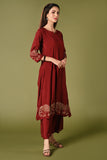  Solid maroon muslin kurti set with elepant print in border and sleeves.
•	Plain colour kurti with elephant prints in border and sleeve.
•	Round neck & 3/4 sleeves.
•	Double sided elastic and comfortable straight fit pants.
•	The marron colour muslin with elephant prints will give a elegant look with cultural touch.
