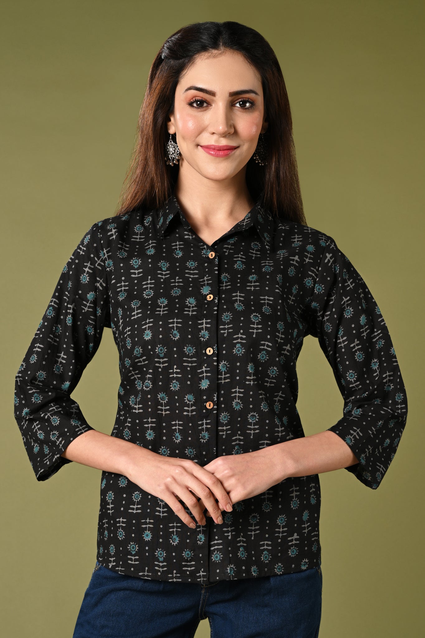 Summer printed black and grey short cotton kurti for jean with collar neck.
•	Straight short kurti with floral prints all over.
•	3/4 sleeves, wooden buttons.
•	Collared neck.
•	Pure cotton material.
