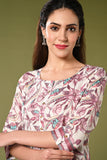 White and pink floral printed rayon daily wear kurti set with 3/4 sleeves roundneck single side pocket and straight pants.
•	Floral prints all over the kurti set
•	Round neck, 3/4 sleeves & single side pocket.
•	Double sided elastic straight fit pants.
•	All day comfort rayon material.
•	White and pink with floral prints will give a balanced and harmonious look.
