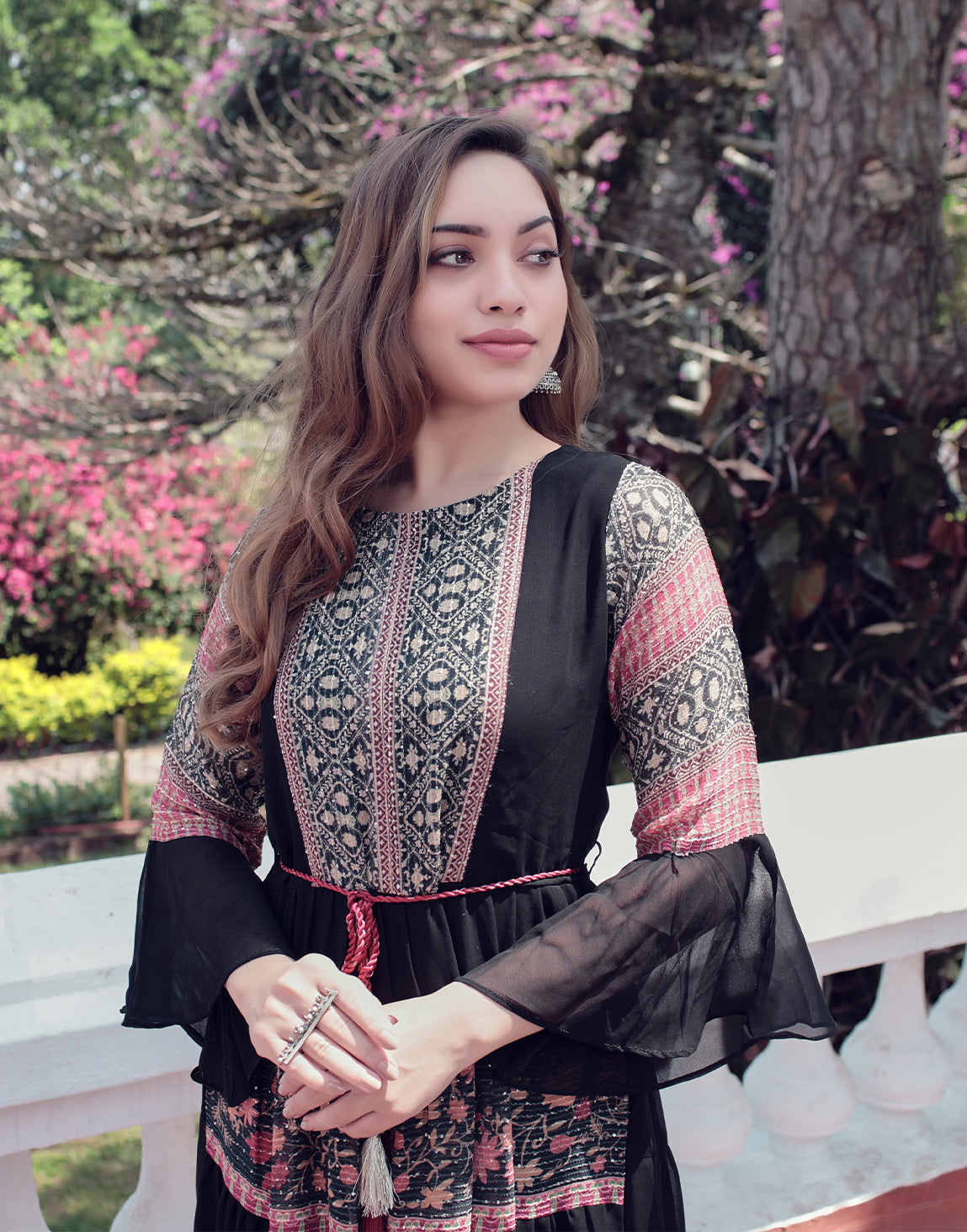 Flare Black kurthi with bell sleeves and rope