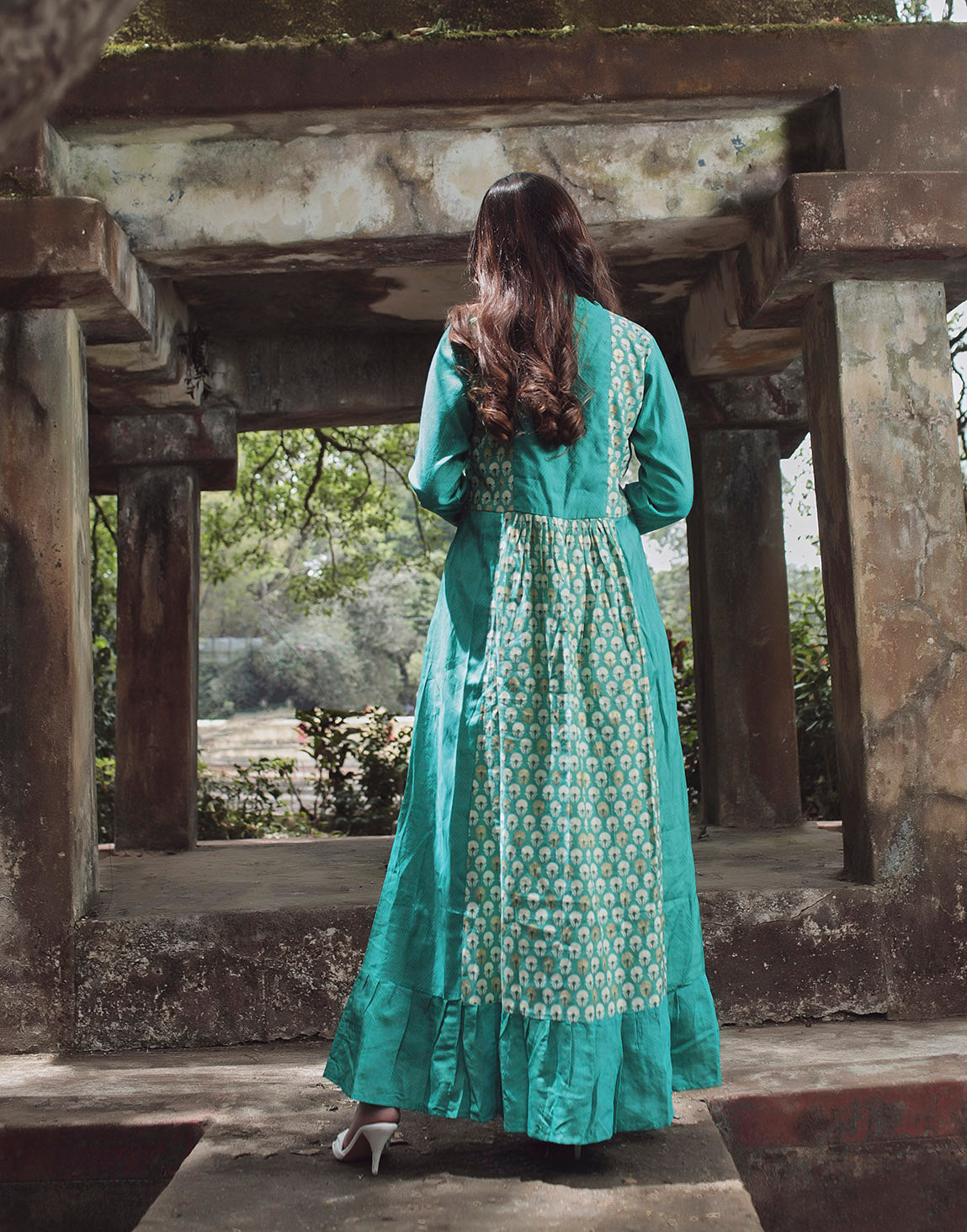 Elegant turquoise blue kurthi with floral print and stripes